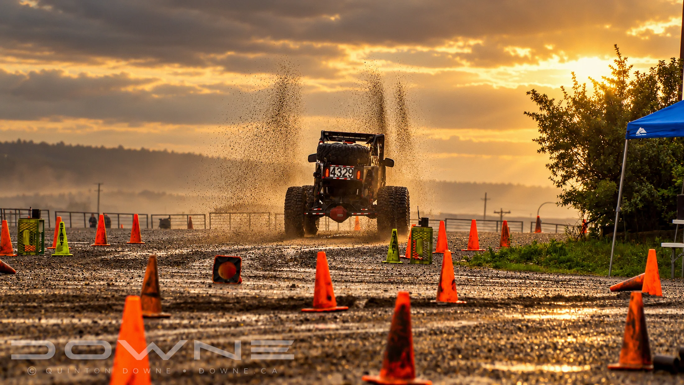 Rallycross car airborne over the course — photograph by QDowne
